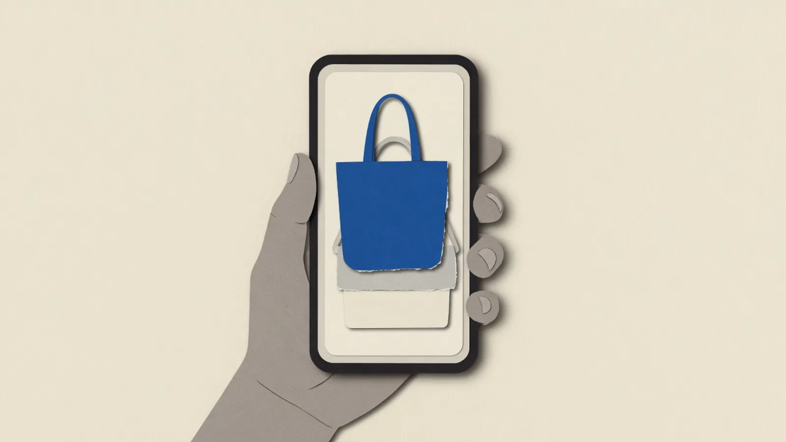 A hand holds a phone showing a tote bag outline over a simple rectangular shoulder bag
